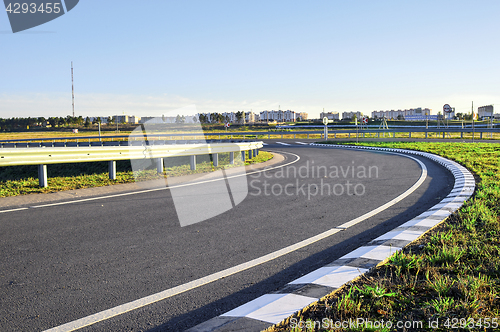 Image of Road without cars and clouds