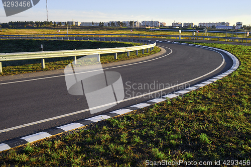 Image of Road without cars and clouds