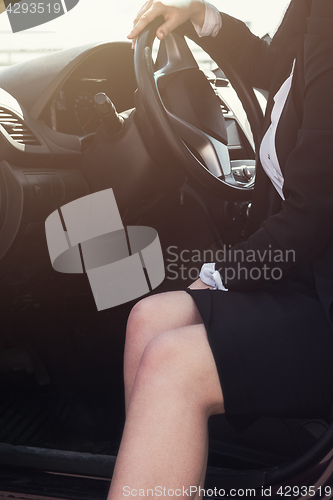 Image of Woman in a car