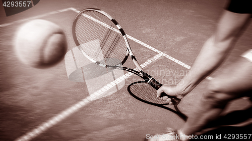 Image of Tennis player stretches to play ball 