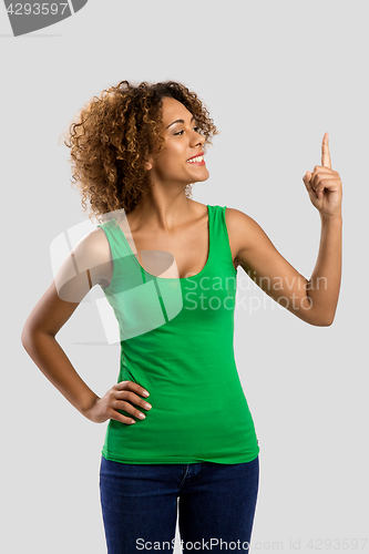 Image of Woman with a finger on the air