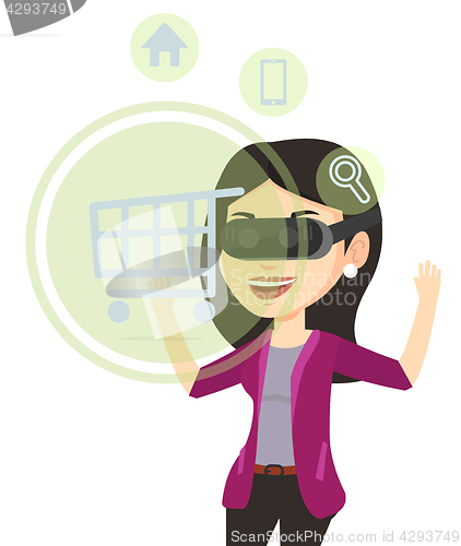 Image of Woman in virtual reality headset shopping online.