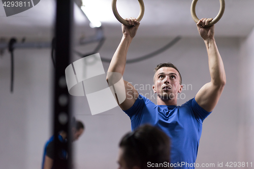 Image of man doing dipping exercise