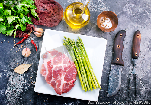 Image of meat with asparagus