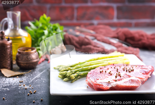 Image of meat with asparagus