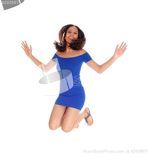 Image of Happy woman jumping.
