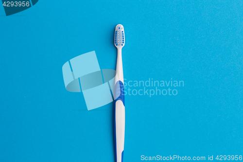 Image of Photo of one blue toothbrush