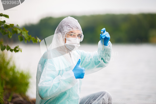 Image of Laboratory assistant with test tube