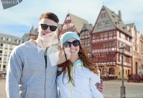 Image of happy teenage couple over frankfurt am main city