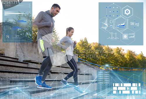 Image of couple running downstairs on stadium