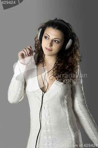 Image of Sexy woman listening music