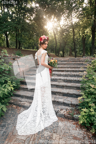 Image of Wedding decoration in the style of boho, floral arrangement, decorated table in the garden.