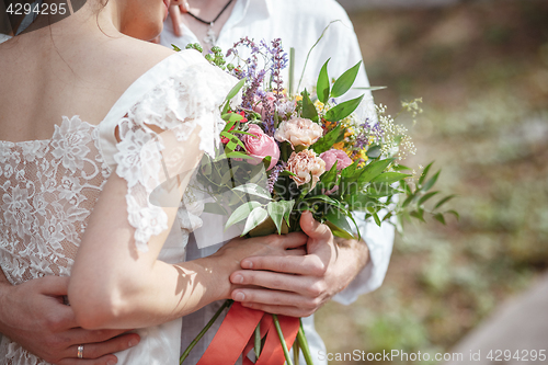 Image of Wedding decoration in the style of boho, floral arrangement, decorated table in the garden.