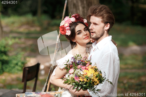 Image of Wedding decoration in the style of boho, floral arrangement, decorated table in the garden.