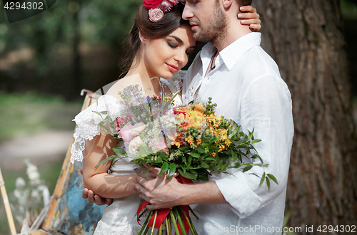 Image of Wedding decoration in the style of boho, floral arrangement, decorated table in the garden.