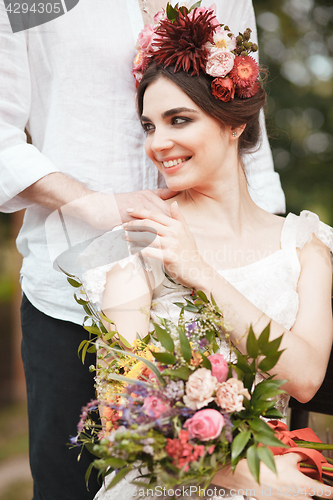 Image of Wedding decoration in the style of boho, floral arrangement, decorated table in the garden.