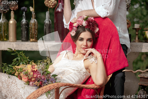 Image of Wedding decoration in the style of boho, floral arrangement, decorated table in the garden.