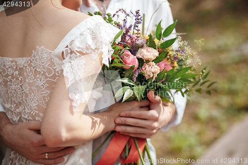 Image of Wedding decoration in the style of boho, floral arrangement, decorated table in the garden.