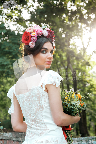 Image of Wedding decoration in the style of boho, floral arrangement, decorated table in the garden.