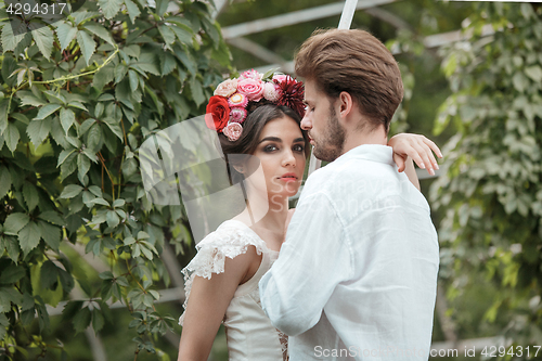 Image of Wedding decoration in the style of boho, floral arrangement, decorated table in the garden.