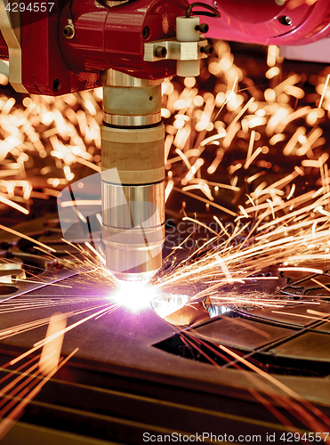 Image of CNC Laser plasma cutting of metal, modern industrial technology.