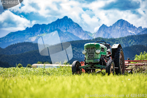 Image of Old tractor in the Alpine meadows