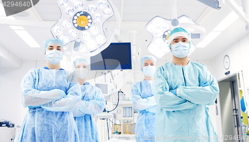 Image of group of surgeons in operating room at hospital