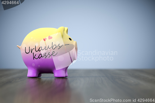 Image of piggy bank with the word holiday fund in german language