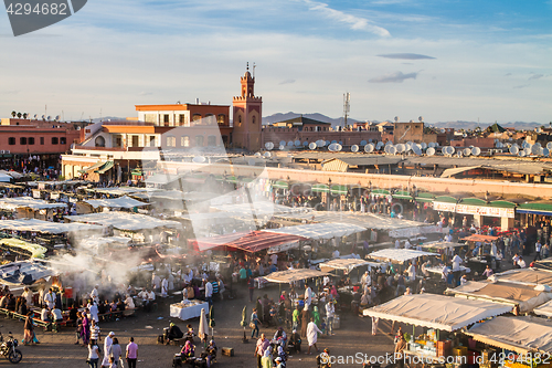 Image of Jamaa el Fna market square in sunset, Marrakesh, Morocco, north Africa.