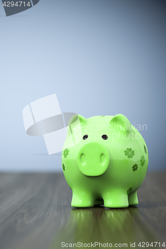 Image of green clover piggy bank background