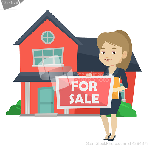 Image of Young female realtor offering house.