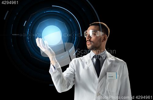 Image of scientist in lab goggles with virtual projection