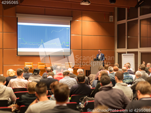 Image of Business speaker giving a talk at business conference event.