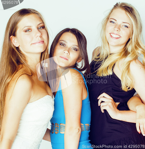Image of group of many cool modern girls friends in bright clothers together having fun isolated on white background, happy smiling lifestyle people concept