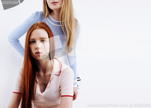 Image of best friends teenage girls together having fun, posing emotional on white background, besties happy smiling, lifestyle people concept close up. making selfie