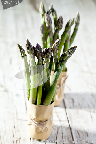 Image of two bunches of fresh asparagus 