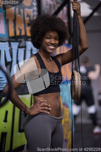 Image of portrait of black women after workout dipping exercise
