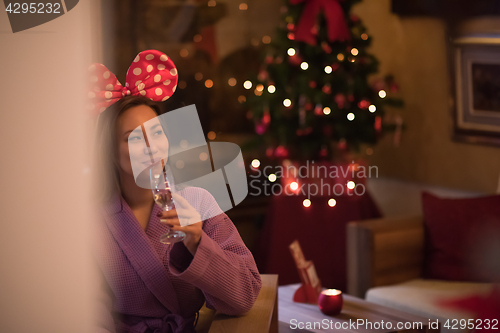 Image of woman drinking champagne at spa