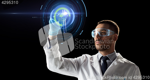 Image of scientist with test tube and virtual projection