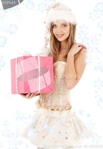 Image of santa helper in corset and skirt with pink gift box