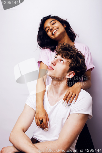 Image of young couple of mixed races girlfriend and boyfriend having fun on white background, lifestyle teenage people concept 