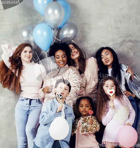 Image of Lifestyle and people concept: young pretty diversity nations woman with different age children celebrating on birth day party together happy smiling, making selfie. African-american, asian and caucasi