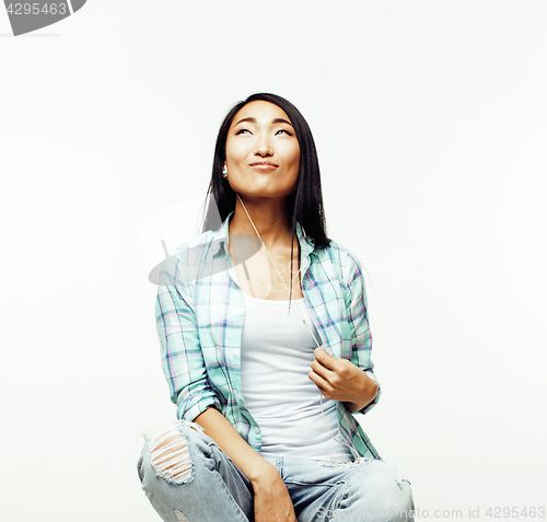 Image of young pretty asian woman posing cheerful emotional isolated on white background, lifestyle people concept 