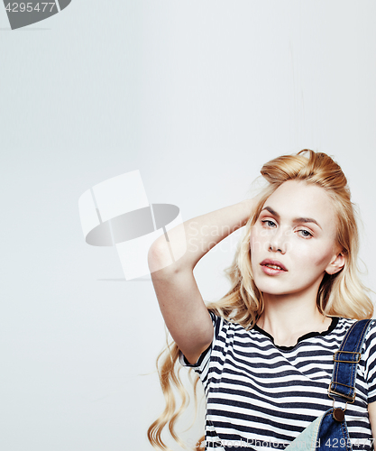Image of young pretty blond teenage girl emotional posing, happy smiling isolated on white background, lifestyle people concept