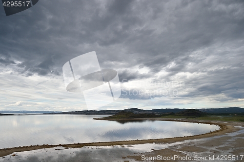 Image of Dark cloudy sky with coast in Northern Norway