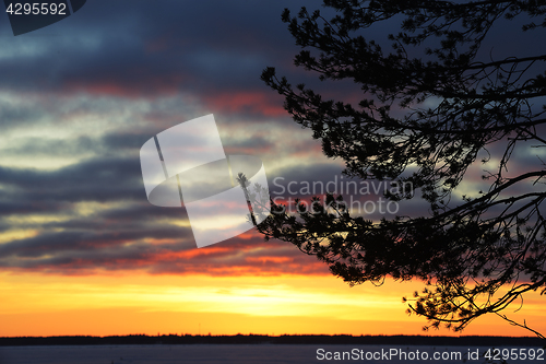 Image of sunset in winter over the lake