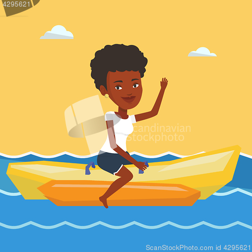 Image of Tourists riding a banana boat vector illustration.