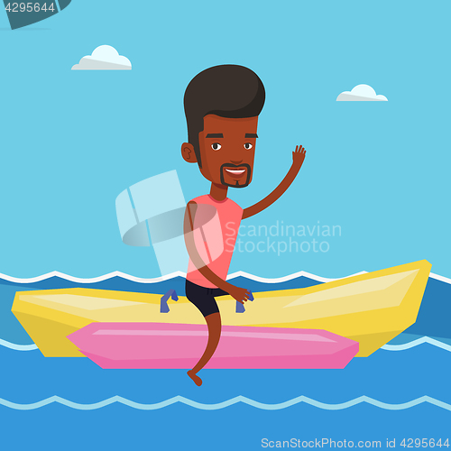 Image of Tourists riding a banana boat vector illustration.