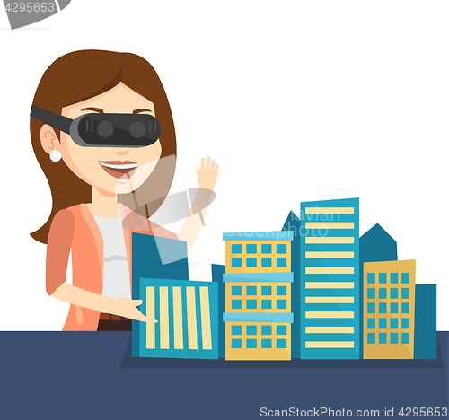 Image of Happy young woman wearing virtual reality headset.
