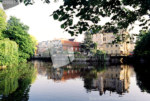 Image of Houses near pond